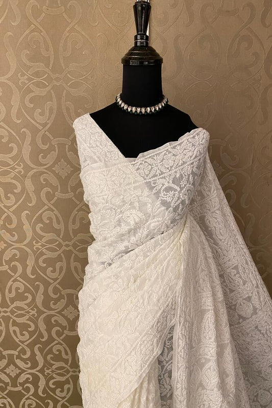 White cotton Chikankari saree with unstiched blouse, perfect for party wear, by Saarang Sarees.