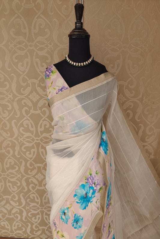 Off-White organza saree with Resham printed design and matching unstiched blouse, perfect for party wear by Saarang Sarees.