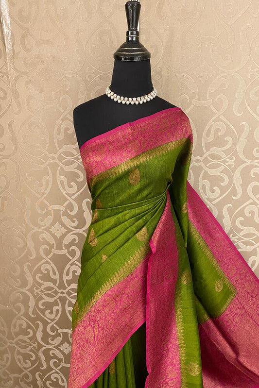 Lime green Tussar Banarasi silk saree with handwoven motifs and unstiched blouse, traditional wear from Saarang Sarees.
