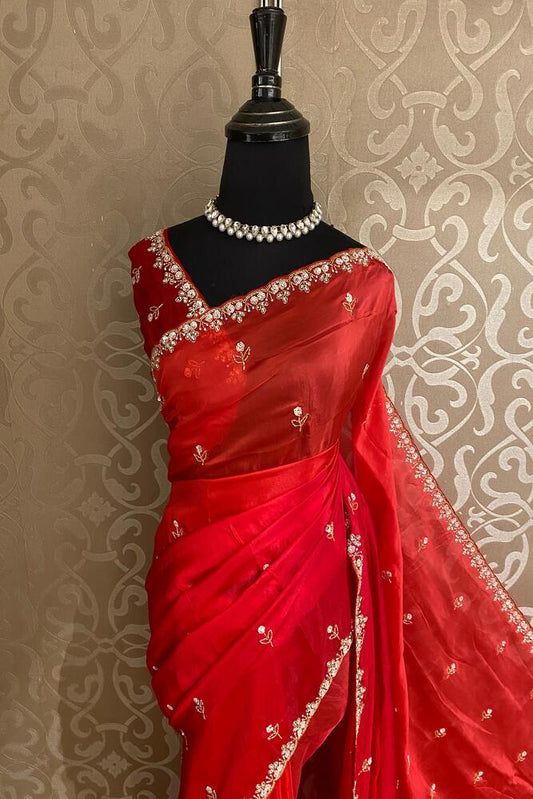 Cherry red soft organza silk saree with embroidery, party wear, shown with unstiched blouse, by Saarang Sarees