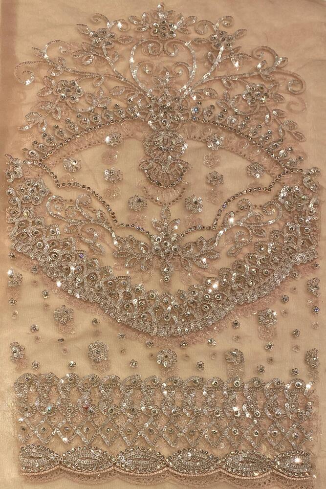 Pink party wear net embroidered saree with a matching readymade blouse, elegant and perfect for special occasions.