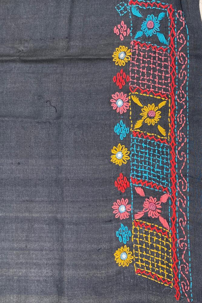 Black Tussar saree with Lambani work from Saarang Sarees, featuring traditional design and unstitched blouse for elegant wear.