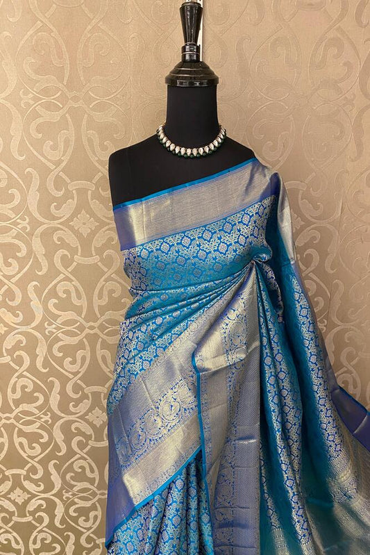 Royal blue pure Kanjeevaram silk saree with intricate gold borders and matching unstiched blouse, traditional wear by Saarang Sarees
