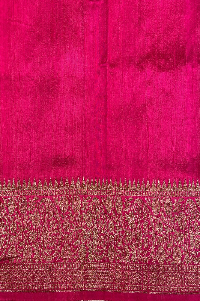 Deep purple pure raw Tussar Banarasi silk saree with handwoven motifs and an unstitched blouse, traditional wear from Saarang Sarees.