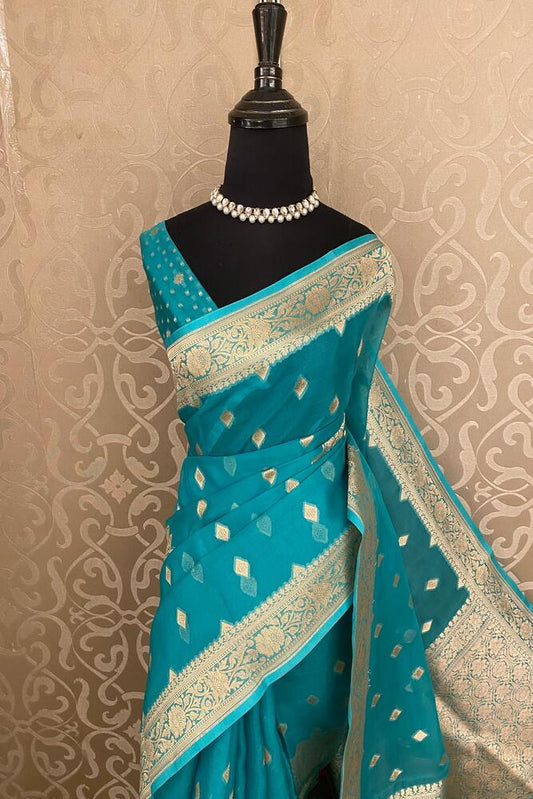 Firozi Kora Banarasi Silk Saree with handwoven work, traditional wear by Saarang Sarees, featuring intricate patterns and unstiched blouse