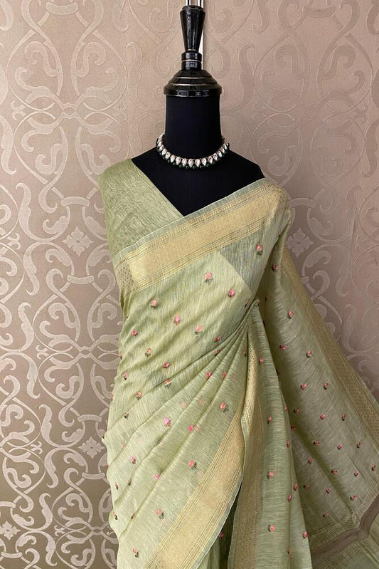 Pista green pure linen Kashmiri work saree with intricate embroidery and an unstiched blouse, traditional wear by Saarang Sarees.