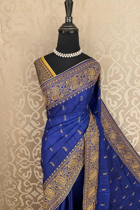 Deep blue Tussar embroidery saree by Saarang Sarees with Kashmiri work border and matching unstitched blouse.