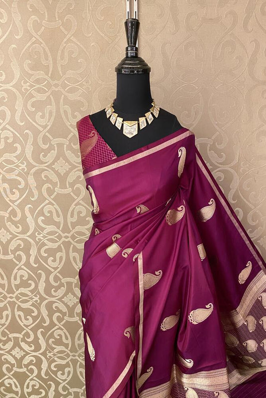 Deep purple Katan Mashru Silk Banarasi saree by Saarang Sarees with intricate gold motifs and matching unstiched blouse for traditional wear.