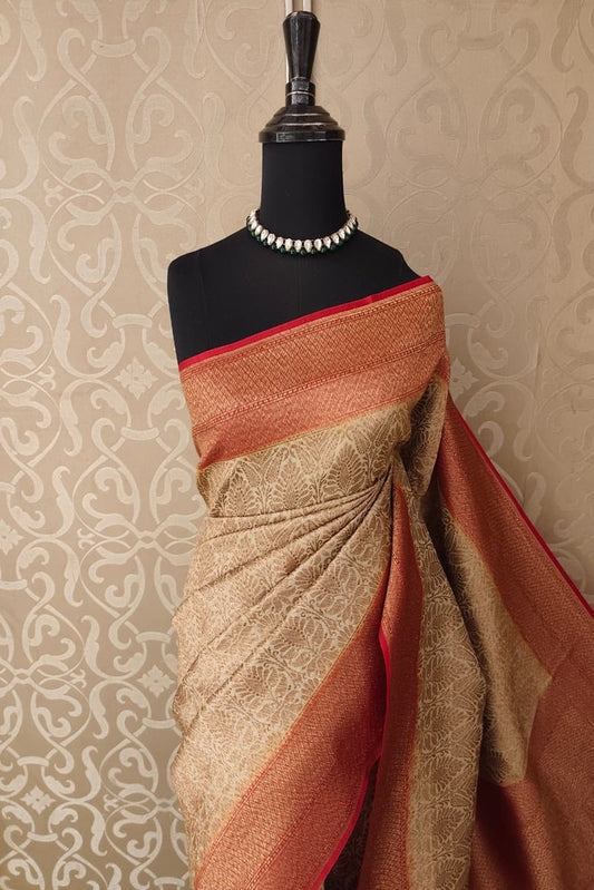 Beige Brocade Kora Banarasi Silk Saree with intricate patterns and unstiched blouse, traditional Indian wear by Saarang Sarees.