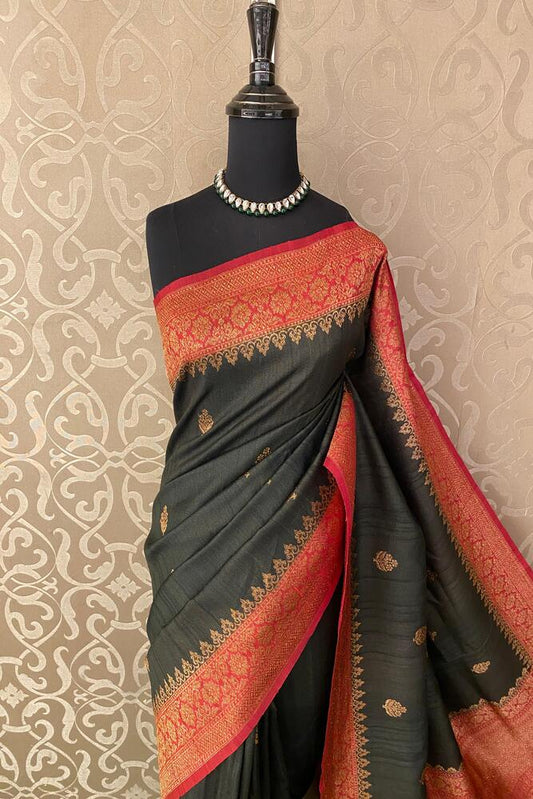 Black Tussar Banarasi silk saree with hand-woven motifs and matching unstitched blouse, traditional wear by Saarang Sarees.
