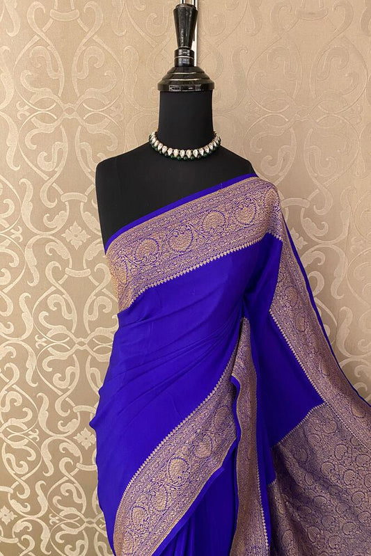 Purple Mysore Crepe Silk Banarasi saree with intricate gold zari work and matching unstiched blouse, traditional Indian wear from Saarang Sarees.