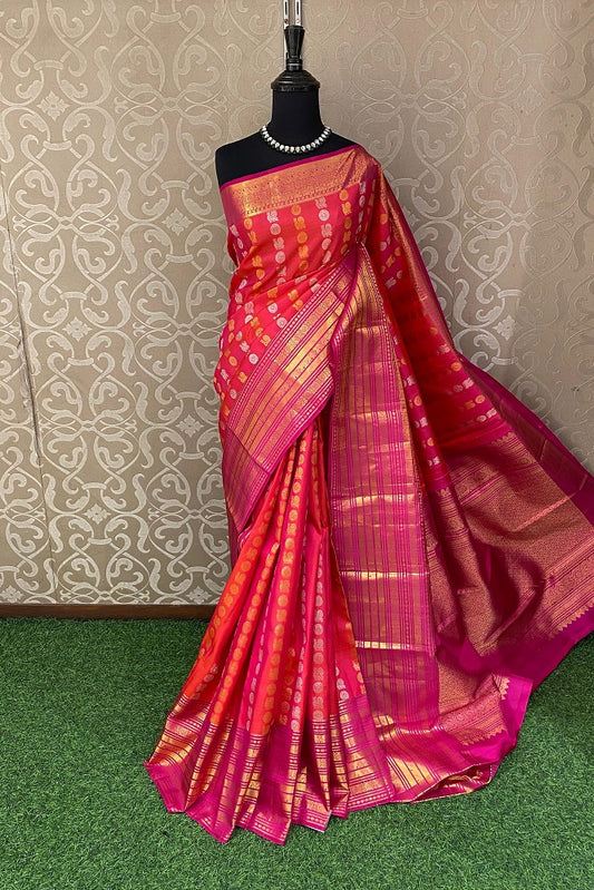 Elegant Rani Pure Kanjeevaram Silk Saree by Saarang Sarees with an unstiched blouse, showcasing traditional South Indian craftsmanship.