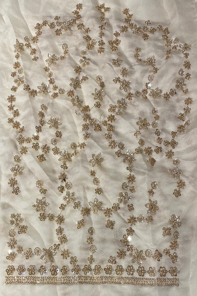 Off-White tissue organza silk embroidery saree with unstitched blouse, perfect for party wear by Saarang Sarees.