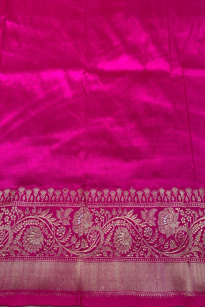 Traditional green Katan Banarasi saree with hand-woven work and matching unstiched blouse, designed by Saarang Sarees