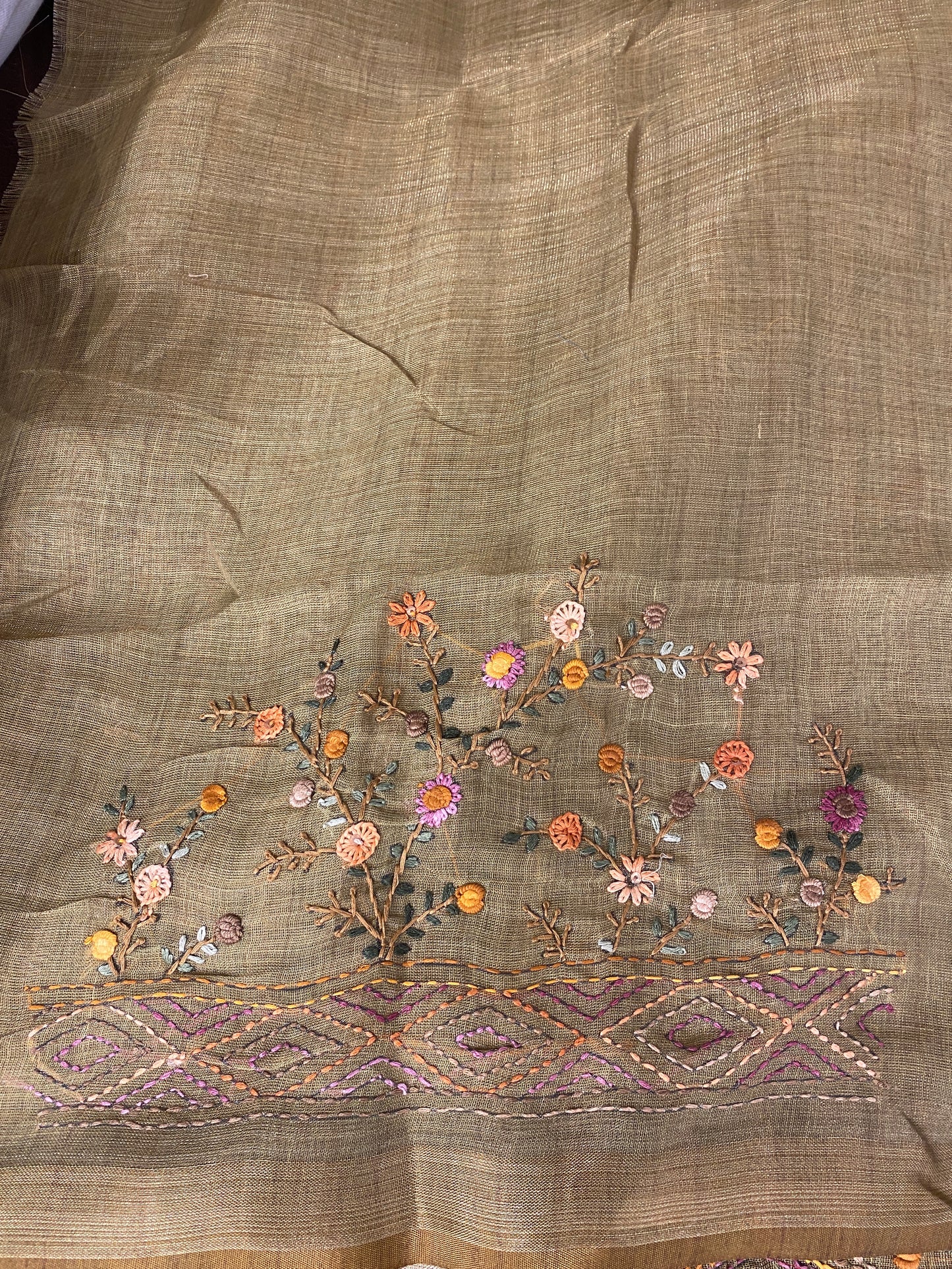 Pista green linen saree with bullion stitch work and matching unstiched blouse from Saarang Sarees, traditional Indian wear.