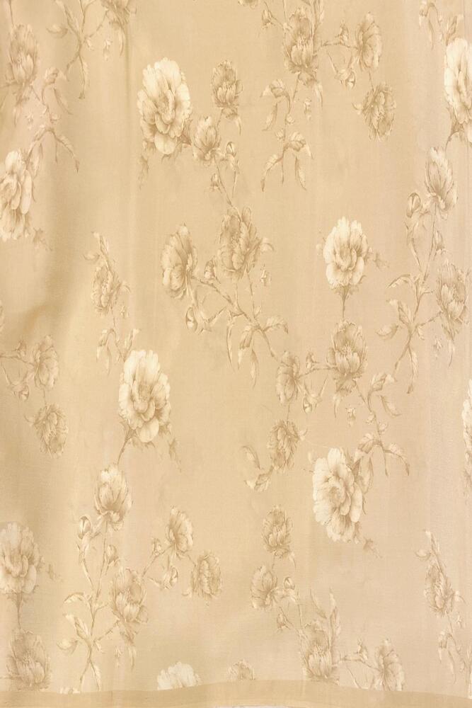 Yellow floral printed chiffon saree with unstiched blouse piece, perfect for party wear by Saarang Sarees.