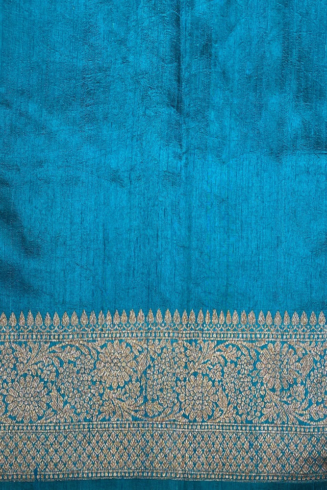 Magenta pure raw Tussar Banarasi silk saree with hand-woven motifs and matching unstiched blouse, traditional wear by Saarang Sarees.
