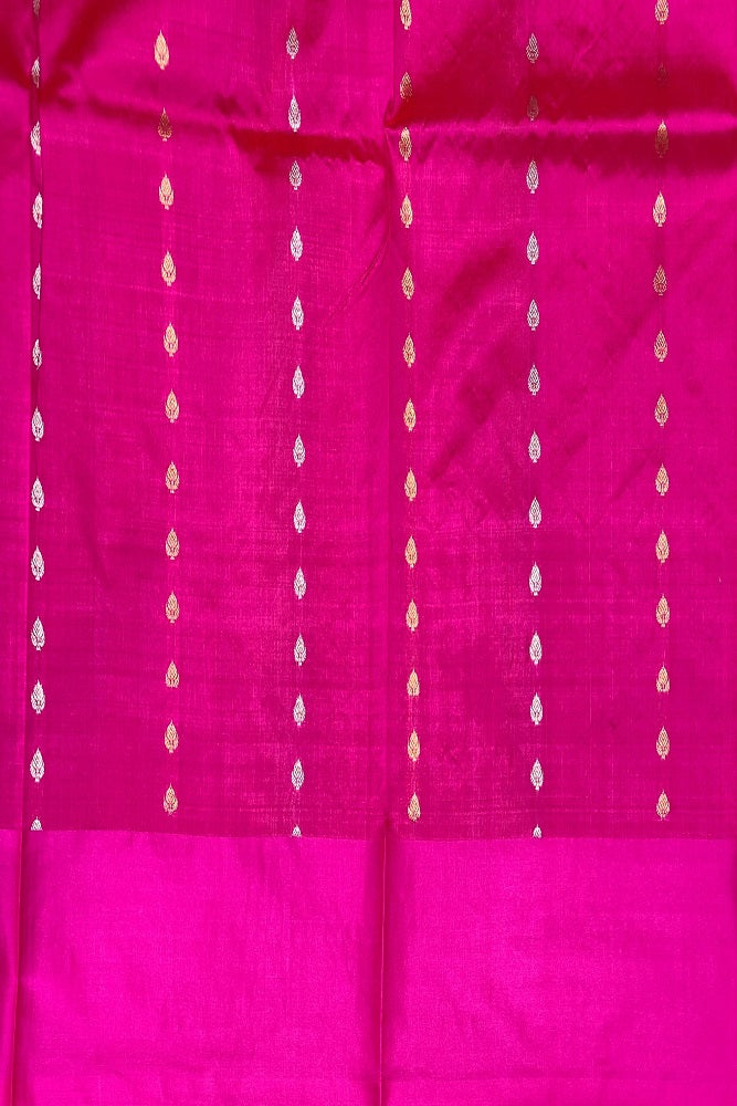 Golden Rani Katan Banarasi saree by Saarang Sarees with handwoven work and an unstiched blouse, traditional Indian attire.