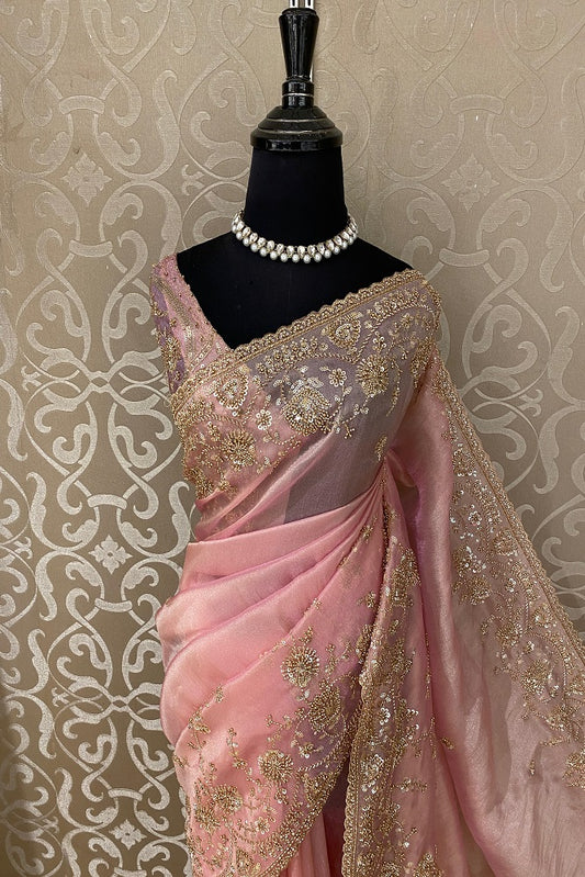 Pink tissue organza silk saree with embroidery for party wear, paired with an unstiched blouse from Saarang Sarees.