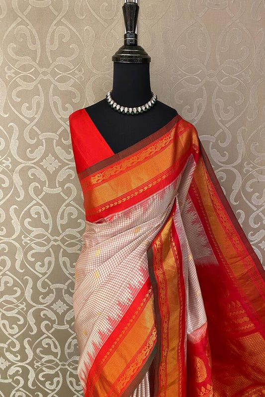 Mauve Gadwal silk saree with intricate gold zari work and matching unstiched blouse, traditional Indian wear by Saarang Sarees.