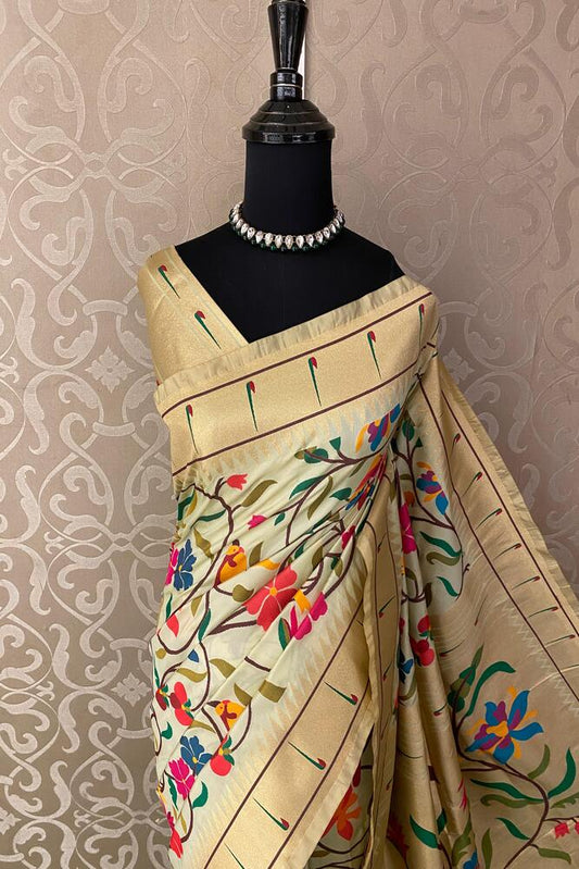 Beige Paithani silk saree from Saarang Sarees with intricate traditional designs and an unstiched blouse for elegant ethnic wear.