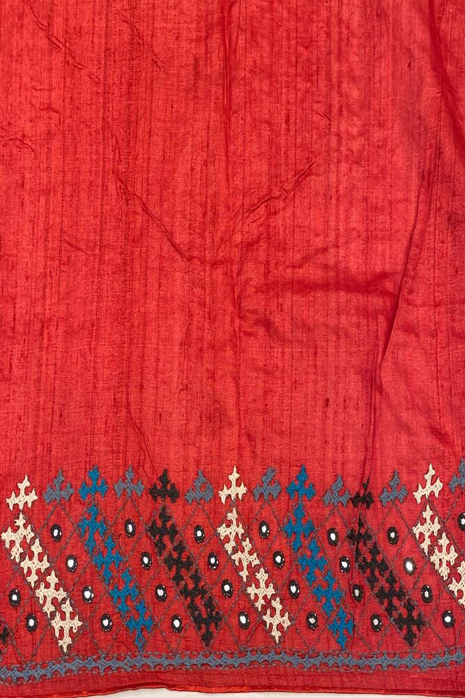 Red Tussar Lambani and Kutch Work saree with stitched blouse, traditional wear by Saarang Sarees, showcasing intricate embroidery.
