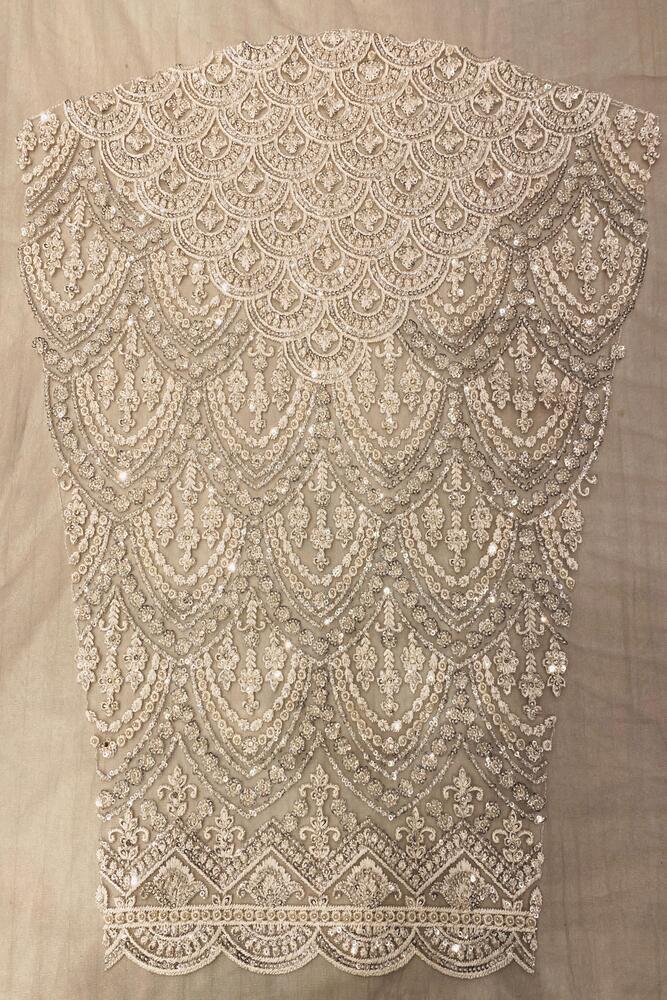 Off-White party wear net embroidered saree with readymade blouse from Saarang Sarees, featuring intricate embroidery and elegant drape.