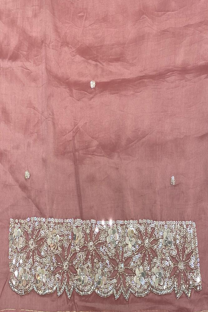 Dusty rose pink tissue organza silk saree with embroidery, party wear, paired with an unstiched blouse from Saarang Sarees.