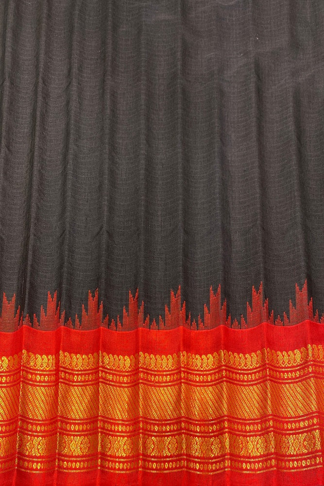 Black Sico Gadwal saree with traditional design and matching unstiched blouse, crafted by Saarang Sarees.