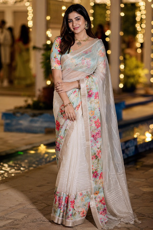 Off-White organza saree with Resham embroidery and printed design, paired with an unstiched blouse, ideal for party wear.