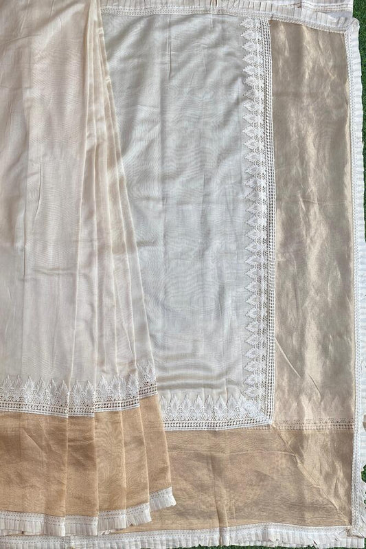 Off-White beige Munga Khaddi saree with intricate embroidery and matching unstiched blouse, traditional wear by Saarang Sarees.