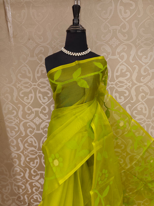 Lime green muslin Dhakai saree without blouse from Saarang Sarees, traditional wear with intricate patterns and lightweight fabric.
