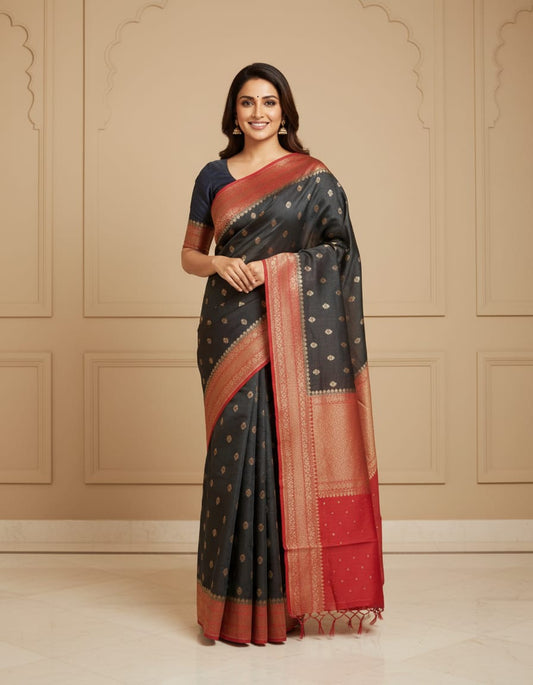 Black Munga Banarasi Silk Saree with intricate gold motifs and matching unstiched blouse, traditional wear by Saarang Sarees.