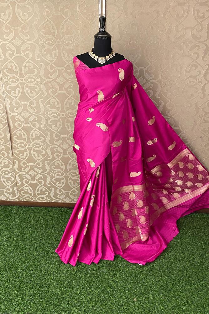 Rani Pink Katan Mashru Silk Banarasi handloom saree with intricate gold motifs and a matching unstiched blouse, traditional Indian wear.