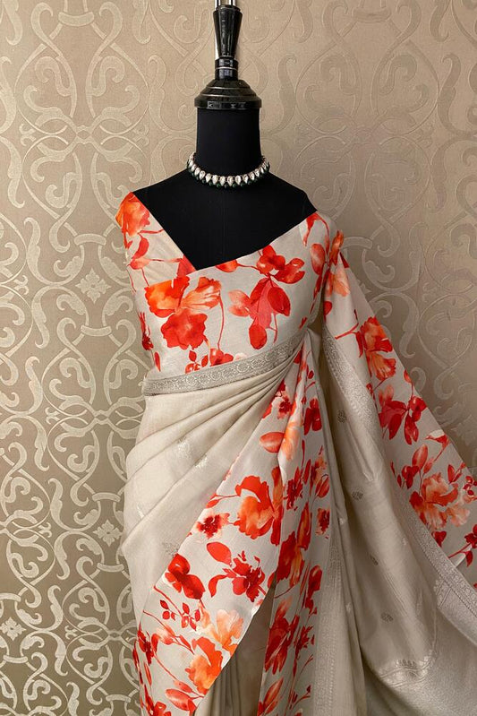 Beige Tussar Banarasi saree with digital mashru border, traditional wear, featuring intricate gold zari work and elegant drape.