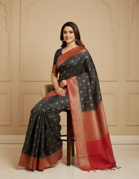 Black Munga Banarasi silk saree with intricate gold zari work and matching unstiched blouse for traditional wear by Saarang Sarees.