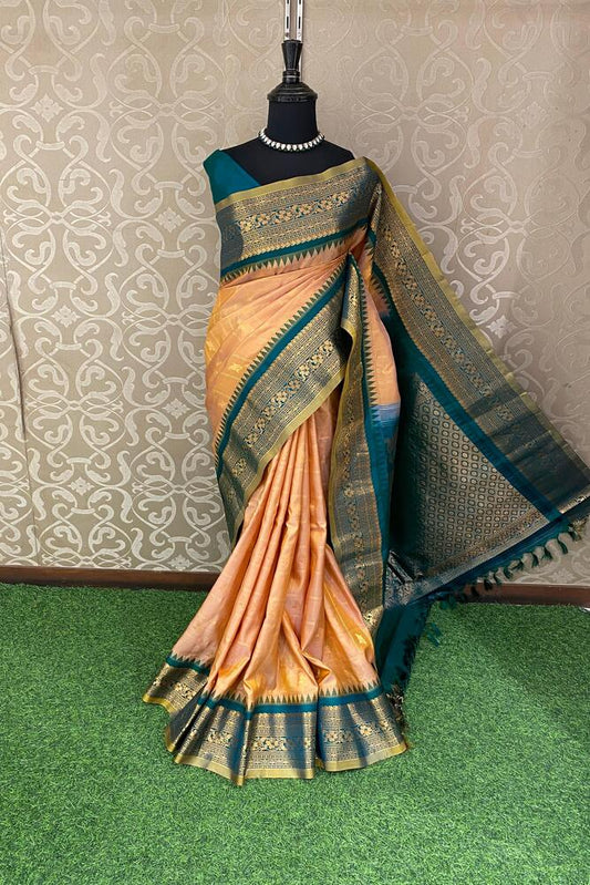 Golden peach Gadwal silk saree from Saarang Sarees with unstiched blouse, showcasing intricate traditional Indian weaving and rich fabric details.