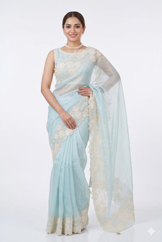 Sky blue organza silk saree with resham embroidery and unstiched blouse, ideal for party wear by Saarang Sarees.