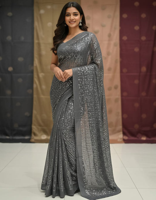 Black satin crepe silk saree with stone work for party wear, featuring an unstiched blouse from Saarang Sarees.