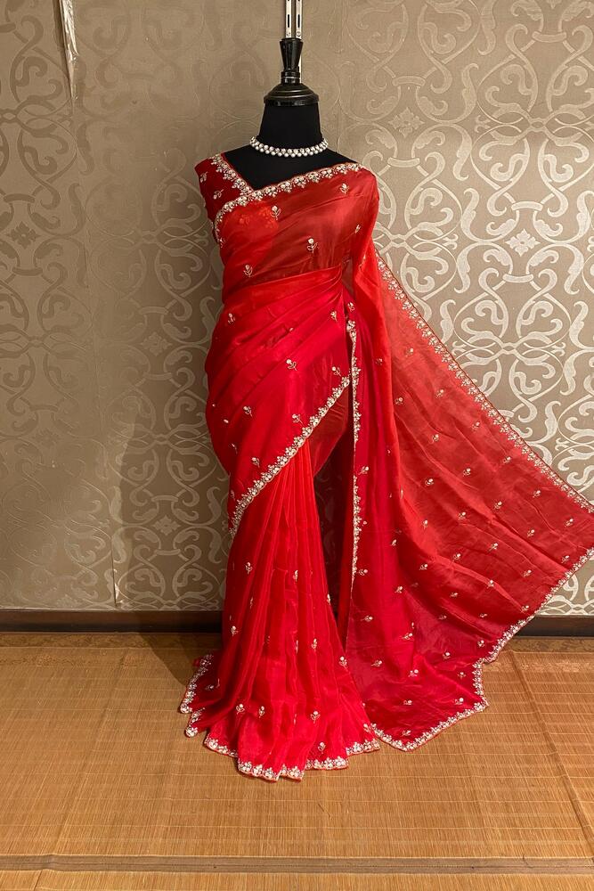 Cherry red soft organza silk saree with embroidery and unstiched blouse, perfect for party wear by Saarang Sarees.