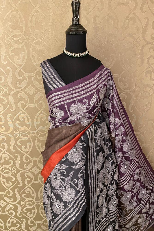 Orang and brown Tussar embroidery saree with Kantha work border and unstitched blouse by Saarang Sarees, traditional Indian attire.
