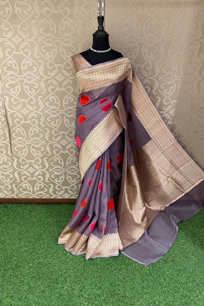 Mauve purple Kora Banarasi silk saree with handwoven work and unstitched blouse from Saarang Sarees, traditional Indian wear.