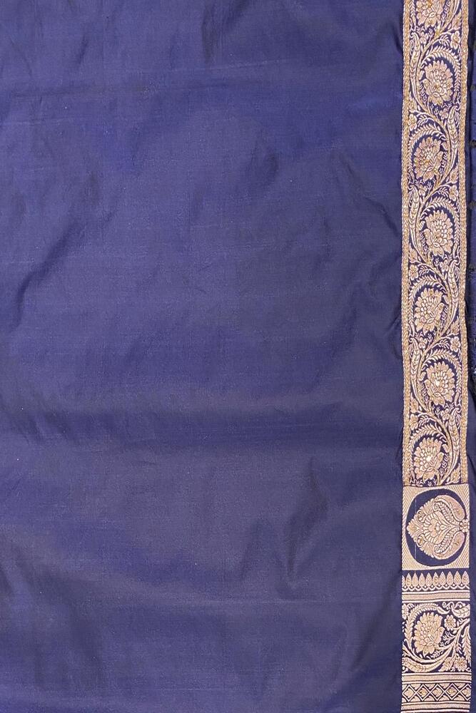 Navy blue Katan Banarasi saree with stone work and unstiched blouse, traditional wear by Saarang Sarees, detailed fabric design.