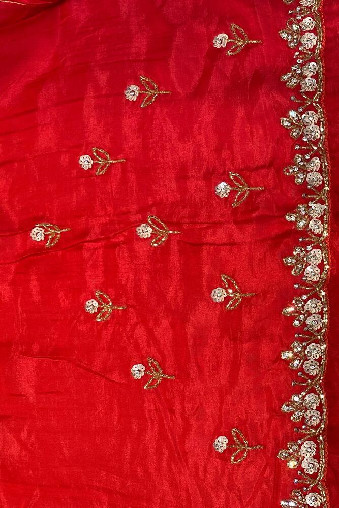 Cherry red soft organza silk saree with embroidery for party wear, paired with an unstiched blouse from Saarang Sarees.