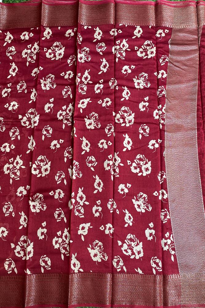 Maroon cotton Chanderi saree with traditional design and unstiched blouse from Saarang Sarees displayed on a mannequin.