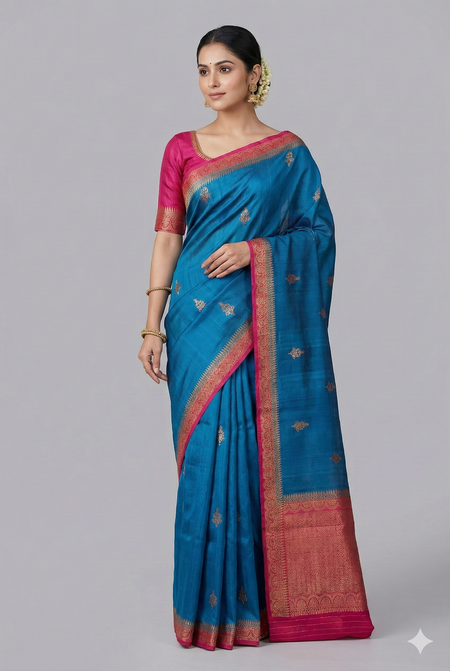 Royal blue Tussar Banarasi silk saree by Saarang Sarees with handwoven motifs and an unstiched blouse for traditional wear.