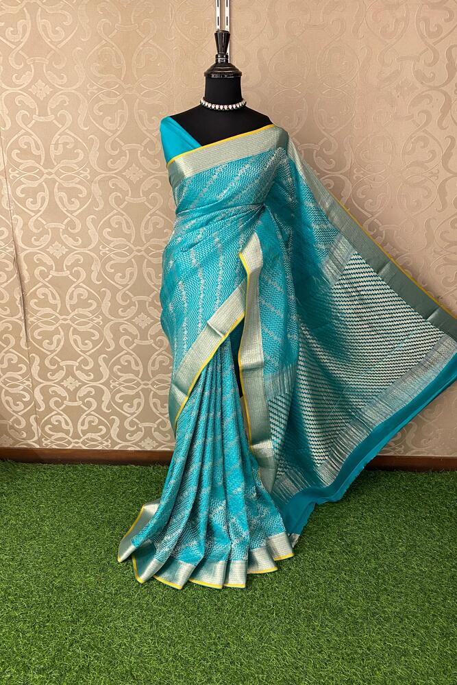 Firozi Mysore Crepe Silk Banarasi Saree with intricate gold zari work and matching unstiched blouse, traditional Indian wear by Saarang Sarees.