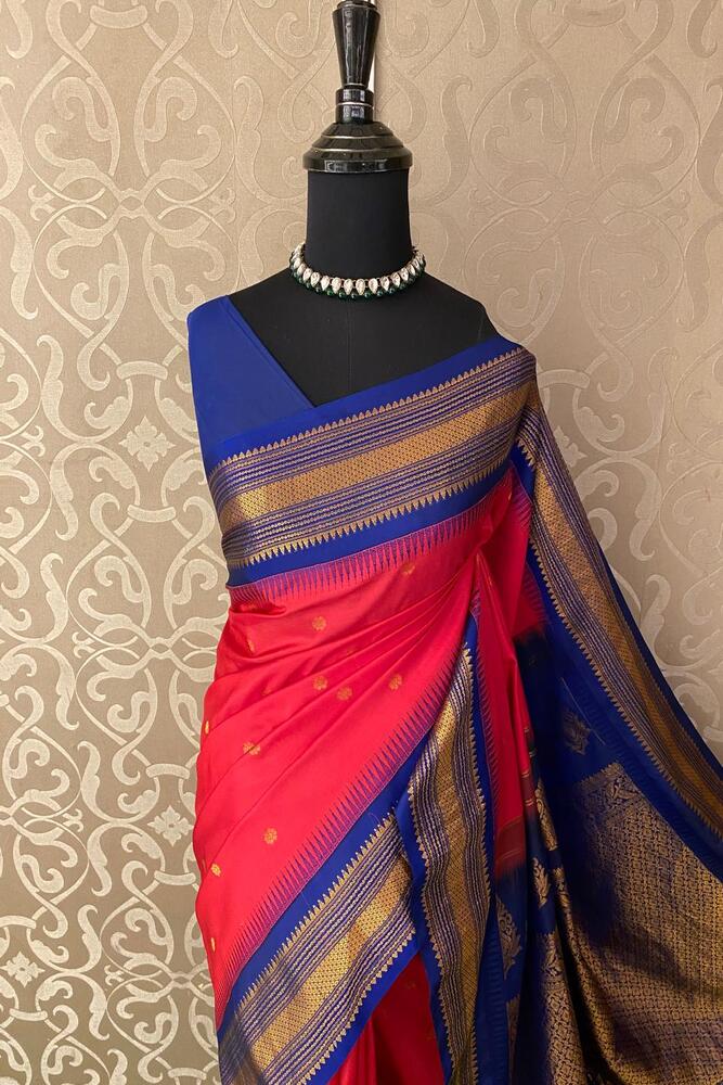 Magenta Gadwal silk saree with intricate border and matching unstitched blouse, traditional Indian wear by Saarang Sarees.
