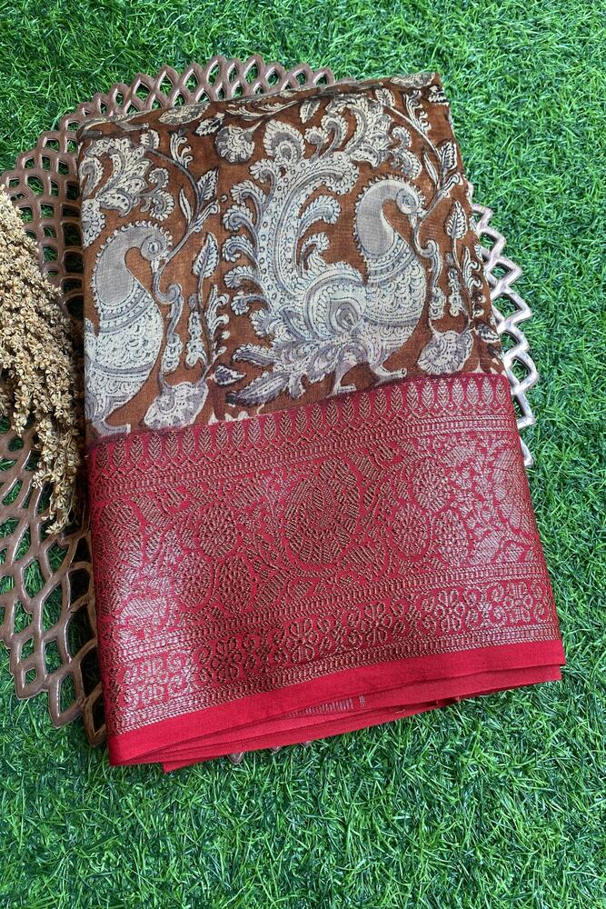 Brown cotton Chanderi saree with intricate weaving and matching unstiched blouse, traditional wear from Saarang Sarees.