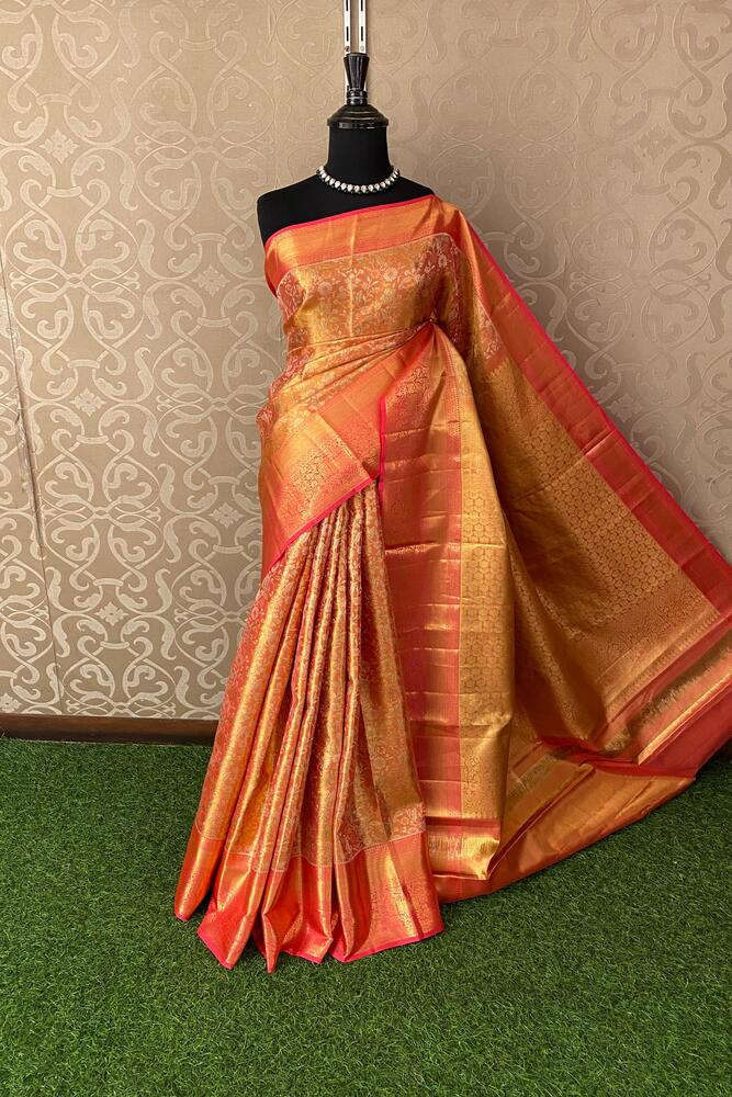 Golden Kanjeevaram Silk Saree by Saarang Sarees with unstiched blouse, traditional wear with intricate woven patterns and rich fabric.